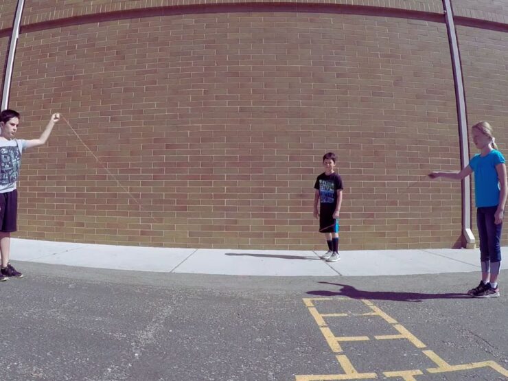 Jump String Setting Up a Jump Rope Challenge at School - Kick the Can
